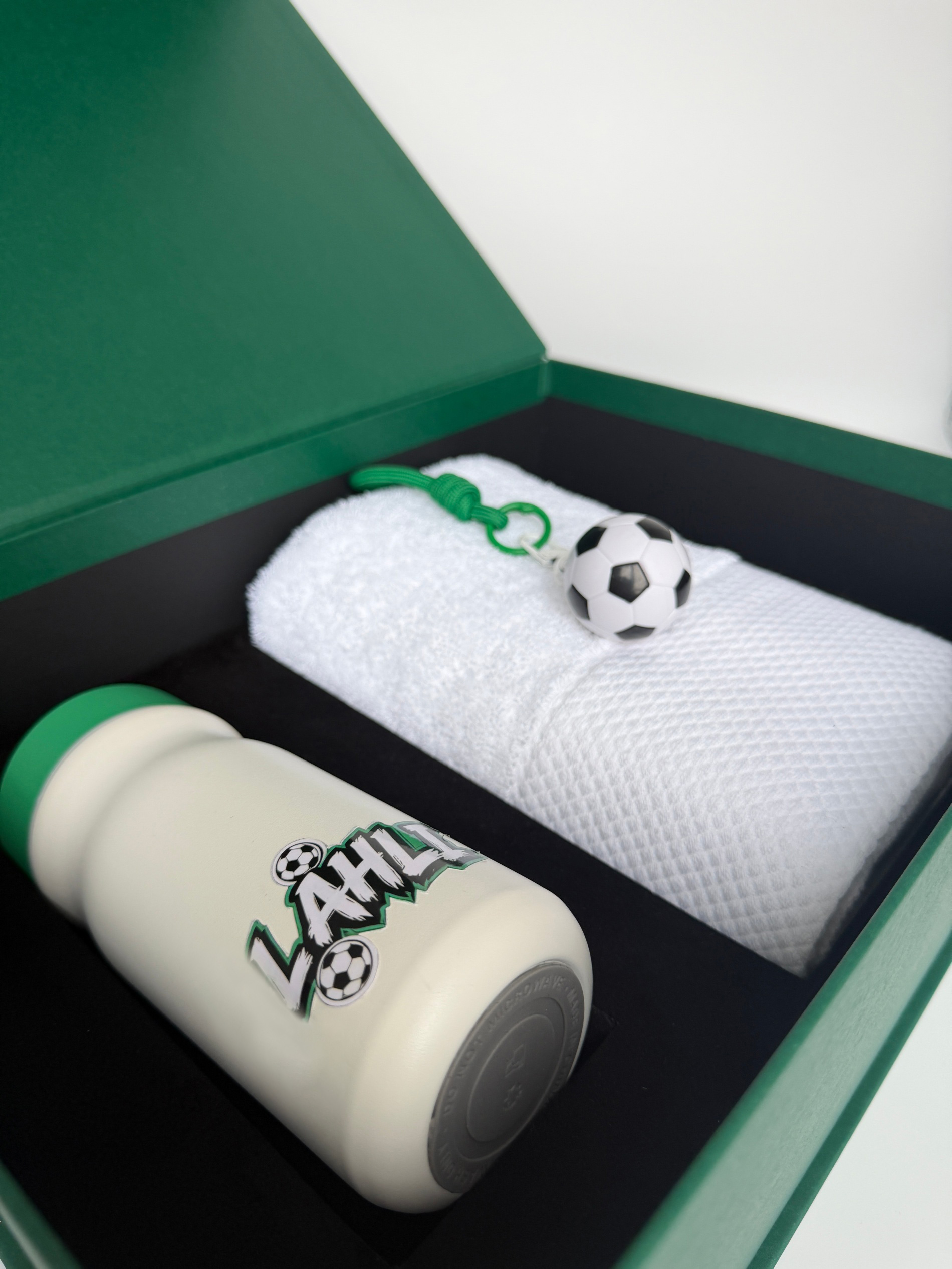 mini-soccer-ball-keychain-and-white-sports-towel-1